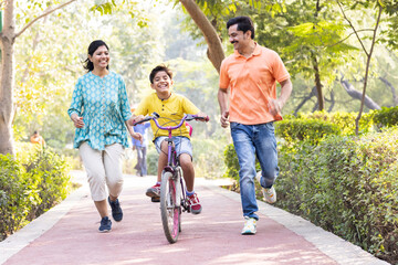 Happy family having fun at park