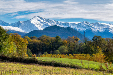 A farm and field at the base of the Pyrenees Mountains © Wasim