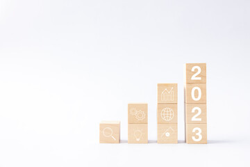 2023 business growing growth concept to success. woods block step with icon concept about business strategy, Action plan, Goal and target, hand stack, project, vision.