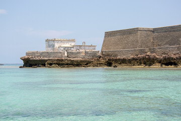 View of  the Chapel of Nossa Senhora de Baluarte and the Saint Sebastian Fortress over the sea, Mozambique