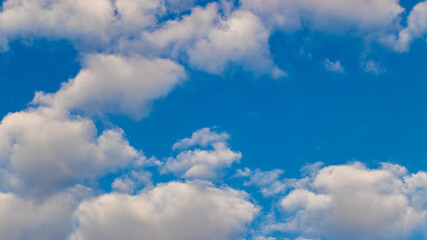 Naklejka na ściany i meble Blue sky with clouds background. Sky daylight. Natural sky composition. Element of design.