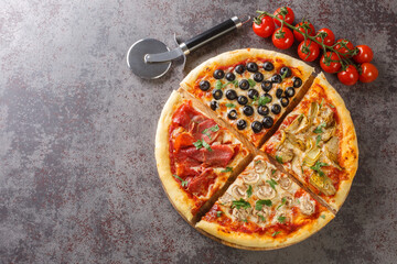 Hot classic Italian pizza four seasons with tomatoes, mozzarella, mushrooms, artichokes, ham and...