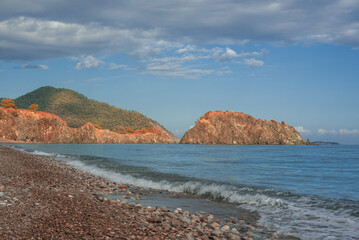 Fototapeta na wymiar View of Cirali beach with rock outcrops, Kemer, Turkey.