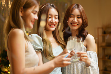 New Year party concept, Young beautiful group clinking champagne to celebrating with fun in party