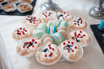 cupcakes with whipped cream and sprinkles