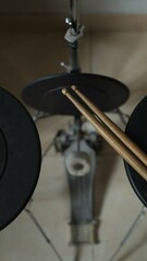 Set of pads for drum practice and drum sticks