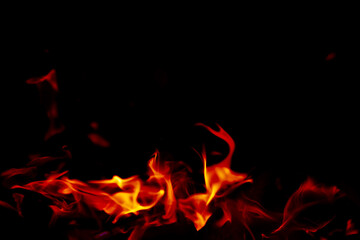 Fototapeta premium Background of the flame in the oven. Overlay layer. Tongues of fire in a fireplace.