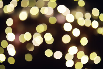 Abstract bokeh background. Golden bokeh circles on dark blue background. Layer overlay.