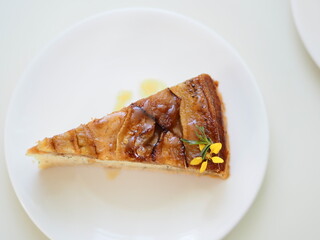 a piece of banana cake top view 