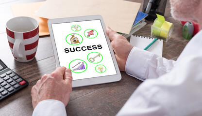 Success concept on a tablet