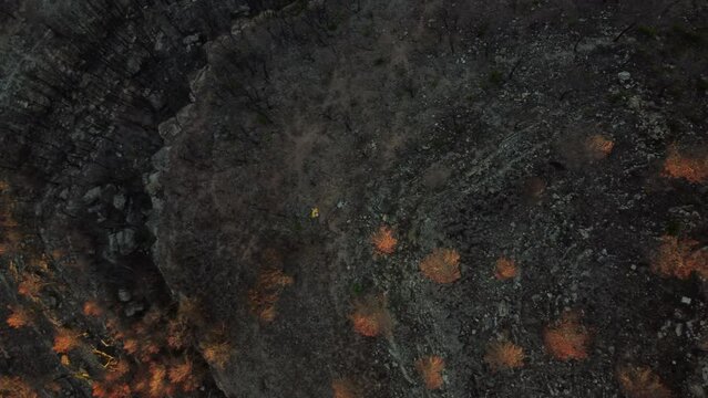 Top down aerial of devasted area after violent wildfire in Pont de Vilomara