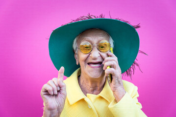 Funny grandmother portraits. Senior old woman dressing elegant for a special event. granny fashion...