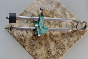 Overhead photo of a vintage ceramic tile cutter