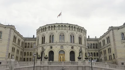 Fotobehang Buildings of the Parliament of Norway. Action.Old white stone building,Storting Monument © Media Whale Stock