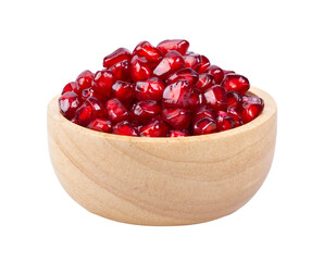 Pomegranate seeds in wood bowl isolated on transparent png
