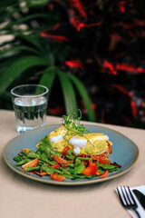 Traditional vegetarian egg benedict, poached egg