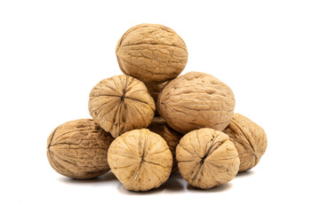 Heap of shelled walnuts isolated on a white background. Clipping Path. Full depth of field. close up
