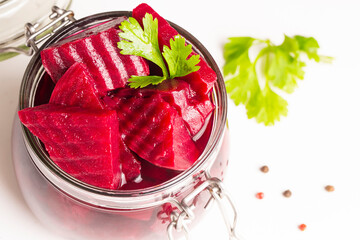 Sliced red beets in a jar - preparation of fermented. Pickled beetroot