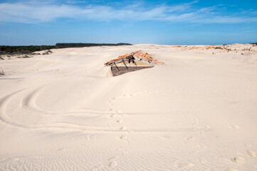 Fototapeta na wymiar ruins of an ancient house in the dunes