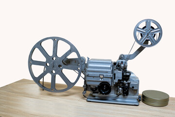 Vintage movie projector on white background,
Retro movie projector and reels