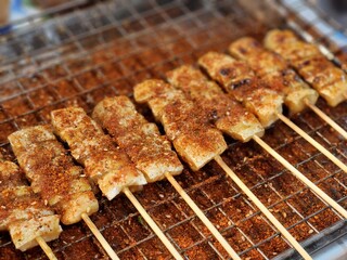 Grilled skewers seasoned with spicy and numbing mala spices, served hot and flavorful. The skewers offer a mouth-tingling taste experience typical of Sichuan cuisine, with a mix of meats 