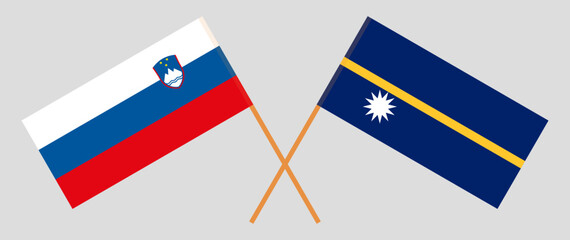 Crossed flags of Slovenia and Nauru. Official colors. Correct proportion