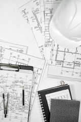 architect design working drawing sketch plans blueprints and making architectural construction model in architect studio,flat lay,architect background,architect blueprint.