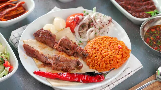 Traditional Turkish meal kebab, Ali nazik, adana kebap, urfa kebap, &ccedil;&ouml;p şiş, patlican kebap, domates kebap, şaşlık, saslik, ciger sis on table top view
