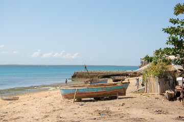 Naklejka na ściany i meble Fishing boat on the beach at the Island of Mozambique