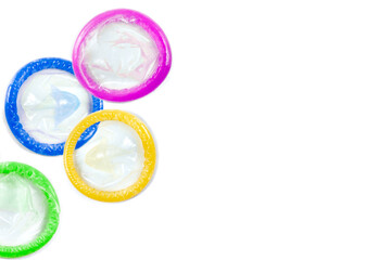 Public health, Top view condoms, grouped on one side seen from above on white background, grouped on the left