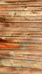 Old Wooden board, wall texture. Fence from a wooden board close-up, texture. Fence boards in the village. Fence background from wooden boards. Old Wood texture. Brown board background. Wall background