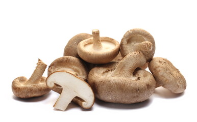 Heap fresh shiitake half mushroom isolated on white