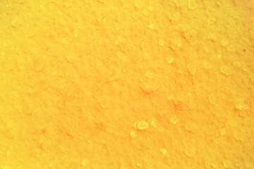 Beautiful bright yellow textured background.