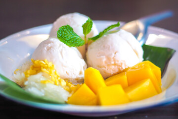 Mango serve with coconut ice cream. Thai dessert