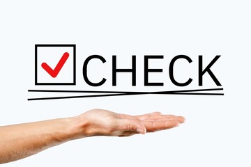 Hand point on CHECK word on simple background