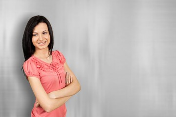 Obraz premium Young woman stay and posing on texture background