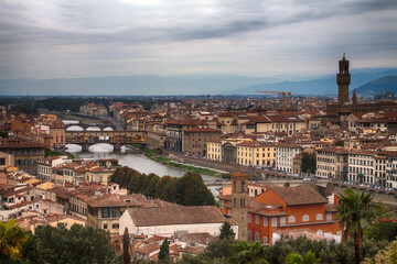 Fototapeta premium Cityscape with bridges over Arno river in Florence, Tuscany, Italy
