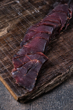 Homemade Jerky Meat, Basturma On A Kitchen Cutting Board