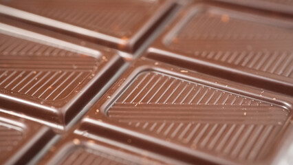 Chunks of dark chocolate. Extreme macro panorama