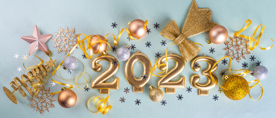 New year 2023 celebration greeting card background Gold numbers 2023 with golden party decoration,...