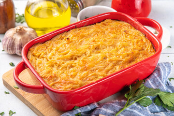 Homemade baked potato casserole with cream, cheese and potato, grated c, french american cuisine, like grated gratin or mac and cheese vegetable alternative