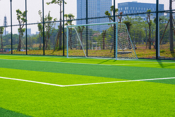 Close-up of the goal and touchline of a brand new football stadium