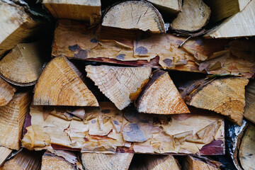 chopped birch firewood stacked horizontally