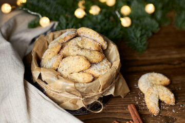 Traditional Christmas German and Australian cookies Vanillekipferl on a wooden background
