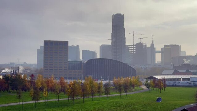 View over the Brussels skyline with the Tour and Taxis park in the foreground