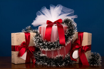 wrapped christmas gifts on blue background