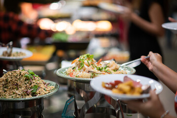 scooping the food, catering, dinner time