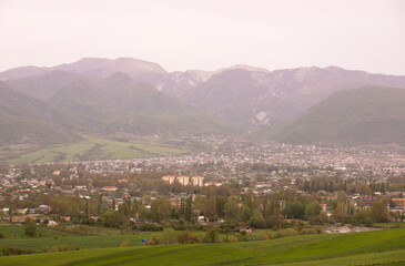 Fototapeta na wymiar The beautiful city of Ismayilli against the backdrop of mountains.