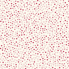 Seamless pattern of small magenta hearts and heart outlines on a cream background.
