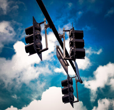 Traffic lights in front of blue sky